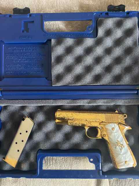 Hand engraved Colt 1911 commander 
