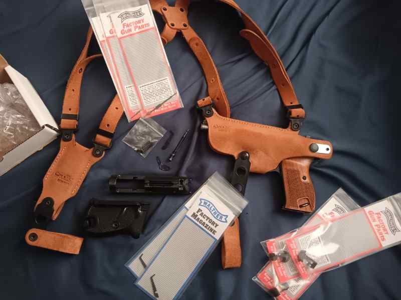Post War P38 w/extras 