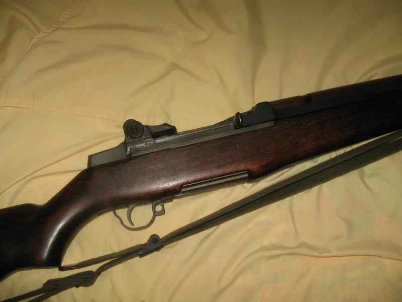 M1 Garand and Reminton revolver
