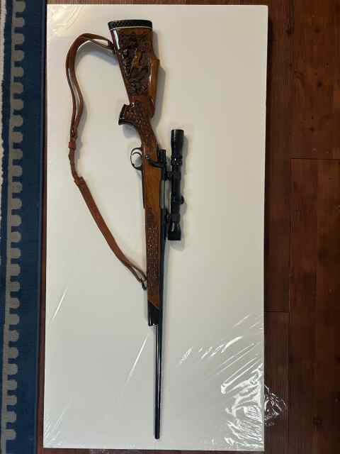 Custom carved 1 or a Kind. 30.06 rifle