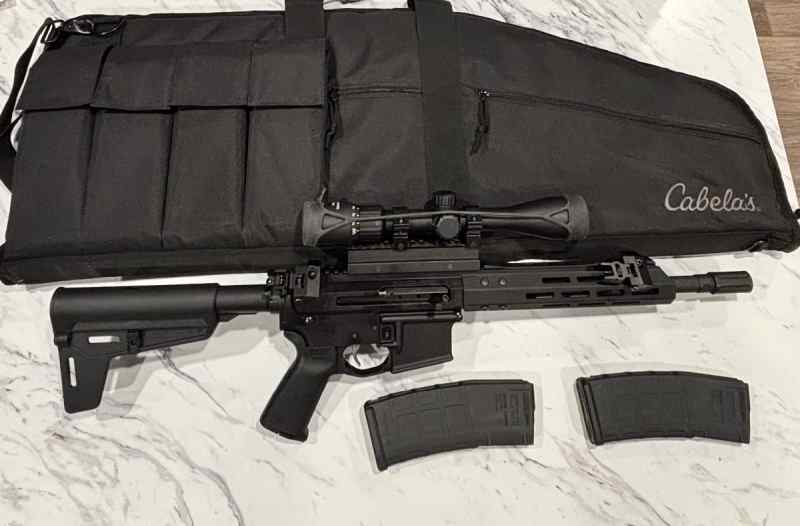 Ar-15 11.5” pistol 556  about 100 rds scope/sights