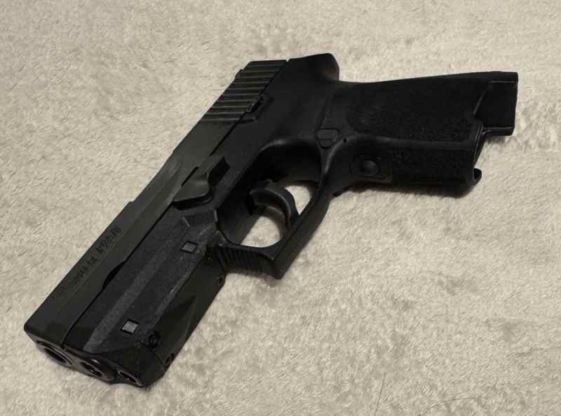Sig Sauer P250 with Lima Laser Grip Module