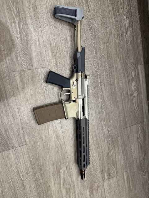 Q Honey Badger 5.56