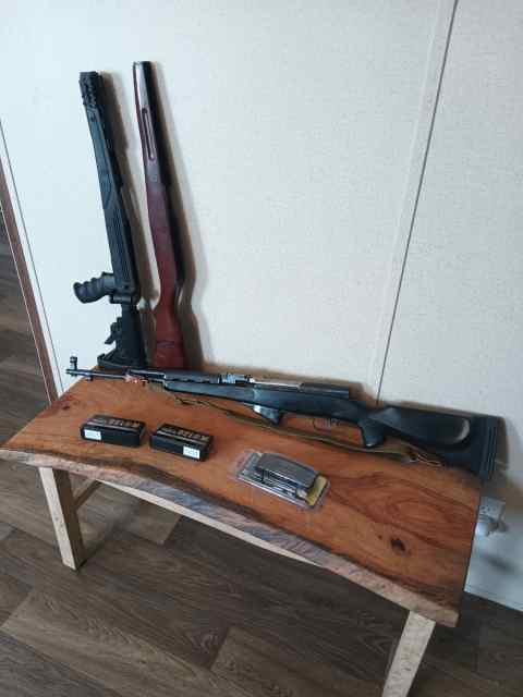 SKS with extra stocks and ammo