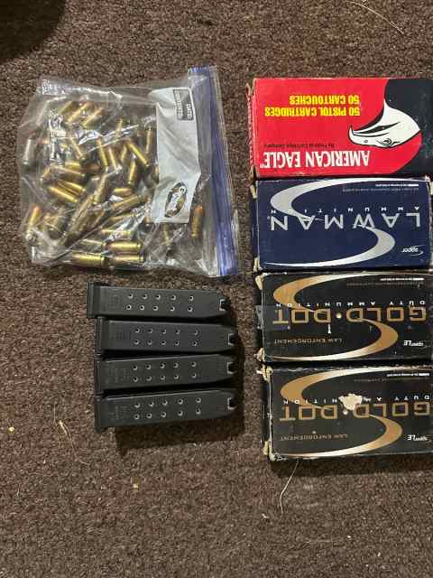 250 rds of .40 cal ammo and 4 Glock 23 mags 