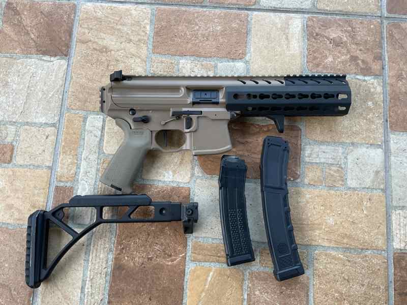Sig Sauer MPX K pistol with extras
