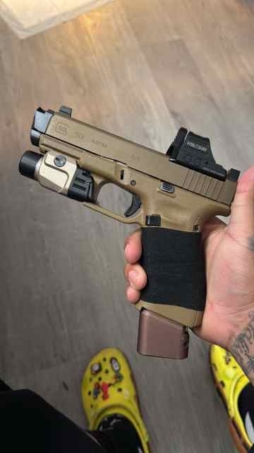 Looking to buy Glock 19 holster and light 